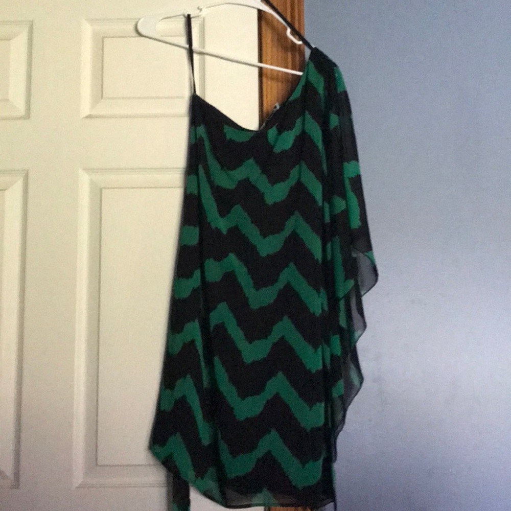 Off the should dress with a draped sleeve